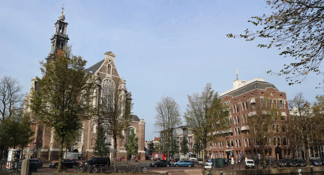 Westerkerk and the canal buildings beside the Anne Frank House