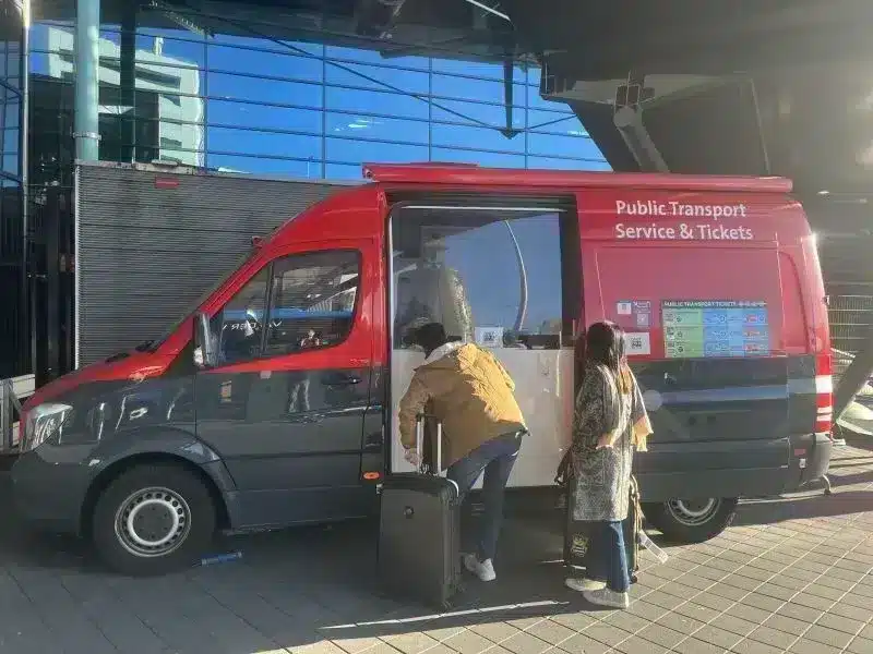 Airport Express red ticket vending bus at Schiphol